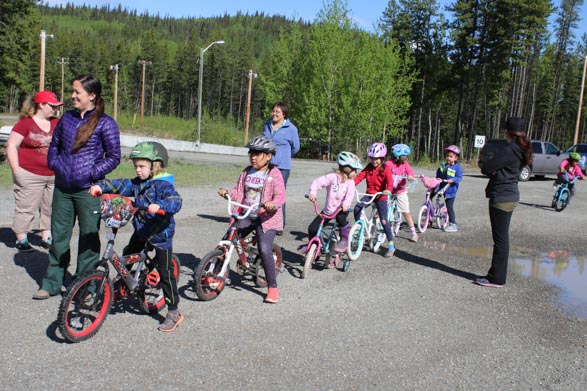 Students biking in Stikine